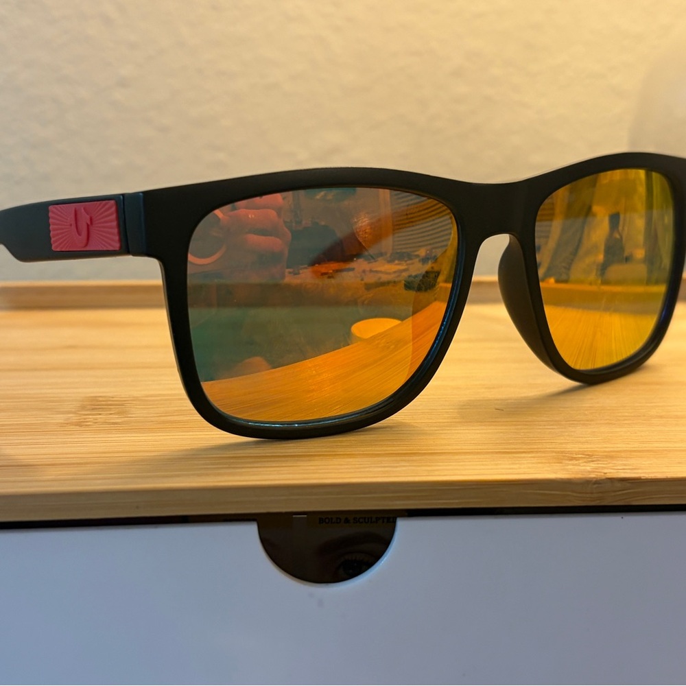 Black Sunglasses with Orange Mirrored Lenses